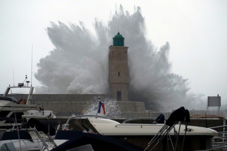 A wave breaks on a lighthouse in Cassis, December 11, 2017 as Stom Ana hits France