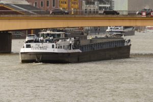 A barge moored on the left bank of the Seine in Rouen, left hurriedly. 