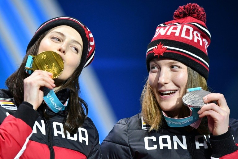 Canada's Kelsey Serwa (g) and Brittany Phelan, gold and silver medalists, skicross at Winter Olympics, Pyeongchang, February 23, 2018.