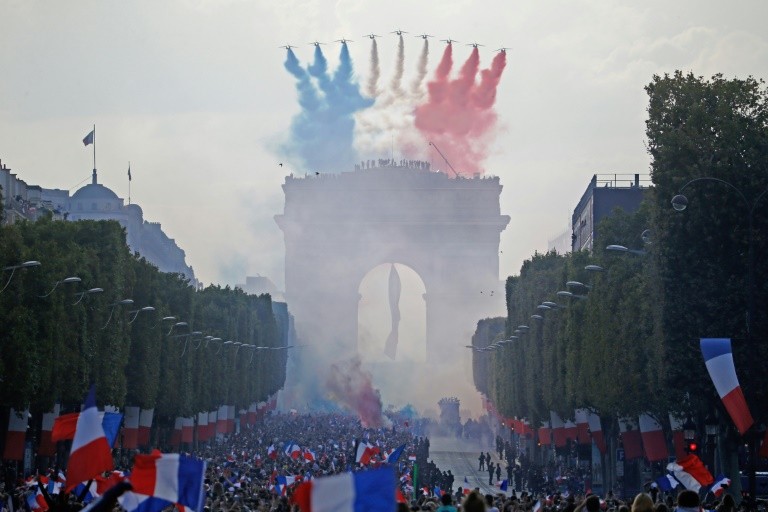 Crowds celebrate the return of les Bleus with the World Cup