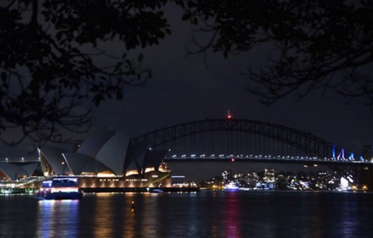 Harbor Bridge and Sydney Opera House plunged into darkness for "Planet Hour"