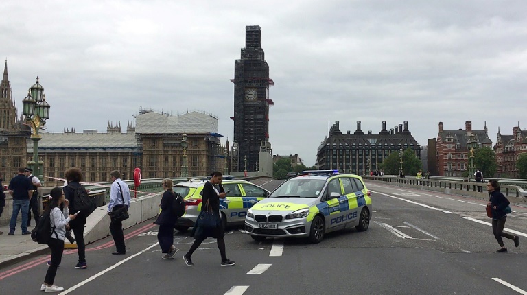 British police block access to Westminster Bridge in front of Parliament in London on August 14, 2018.