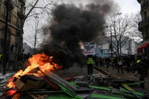 Barricades burned in Paris during the demonstration of Yellow Vests on January 26, 2019. 