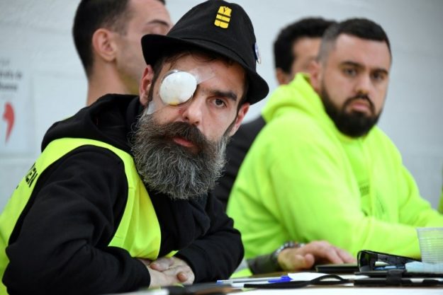 Jérôme Rodrigues and Eric Drouet figures "yellow vests", after the first was seriously wounded in the eye, in Paris, January 30, 2019. 