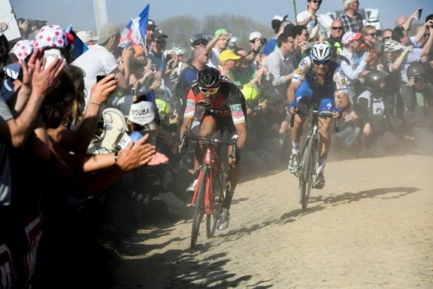 Czech Zdenek Stybar in the wheel of Belgian Greg Van Avermaet finally winner of Paris-Roubaix, April 9, 2017.