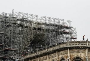 Notre-Dame Cathedral is being covered in Tarpaulin to protect it from the elements