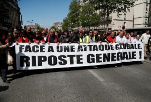 The banner "General Response" leading the event bringing together CGT trade unionists, leftist activists and "yellow vests", Saturday, April 27, 2019 in Paris.