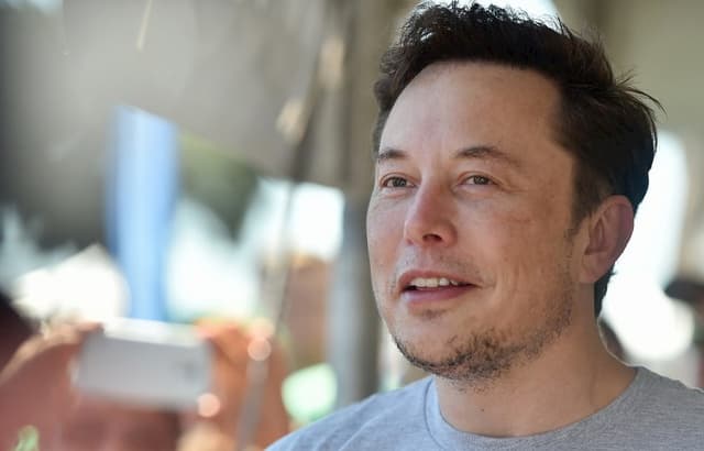 Elon Musk says Tesla will cut costs to avoid bankruptcy