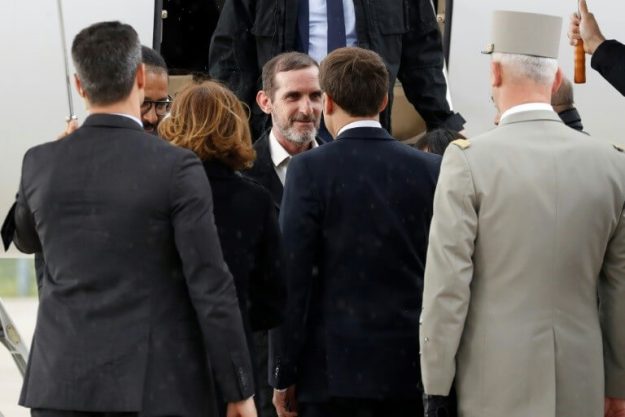 President Macron welcomes ex-hostages from Burkina Faso to Villacoublay on May 11, 2019.