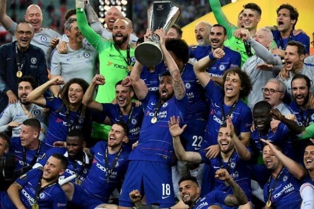 French striker Olivier Giroud held the trophy alongside his Arsenal-winning Chelsea teammates in the Europa League final on 29 May 2019 in Baku