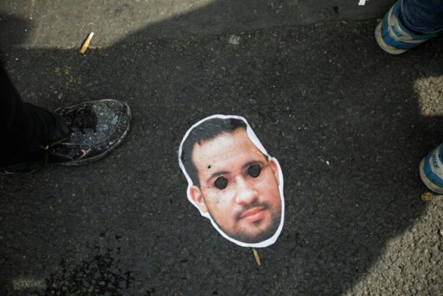 A mask of Alexandre Benalla during the demonstration of May 1st in Paris.