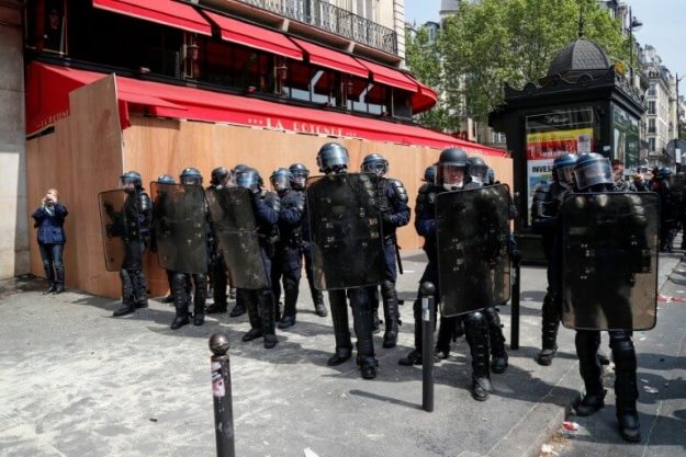 Police officers in front of the restaurant La Rotonde, May 1, 2019 in the Montparnasse district in Paris. 