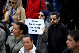 Some people take part in a white march in Lorient on June 13, 2019, in tribute to the 10-year-old boy killed by a driver.