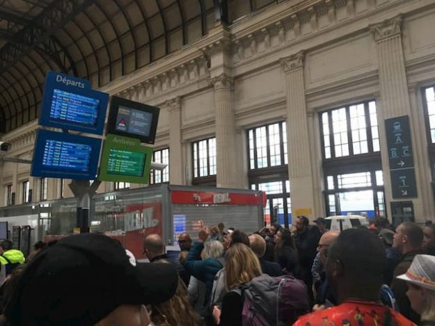 Travellers waiting at Bordeaux station for news after bomb threat