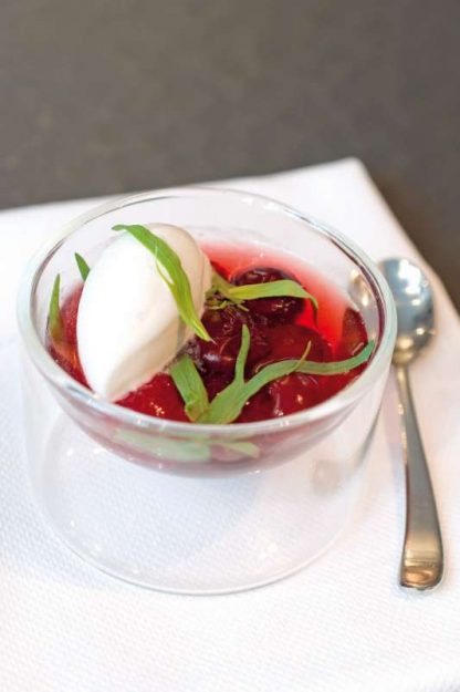 Poached cherries with tarragon, creamy white chocolate.