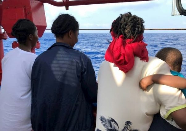 Bintu (g) ​​and his son aboard Ocean Viking on August 10, 2019.