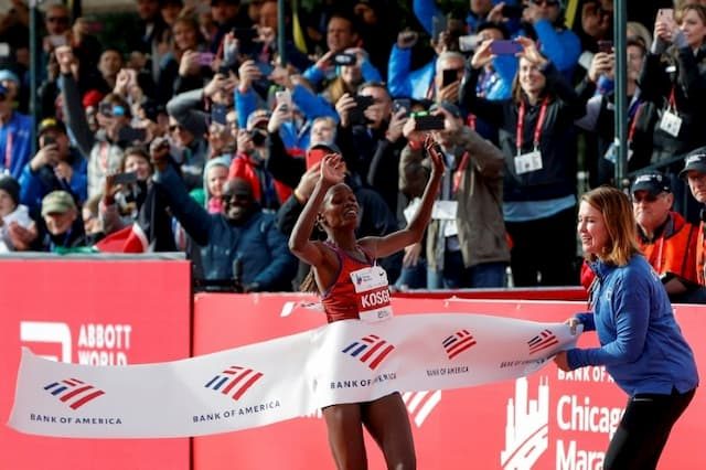 Brigid Kosgei's joy on the finish line of the Chicago Marathon, October 13, 2019.