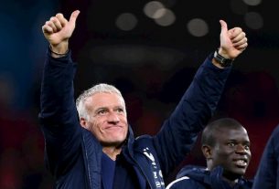 The coach of the Blues Didier Decschamps arms raised after the victory against Albania in qualifying for Euro-2020, November 17, 2019 in Tirana.