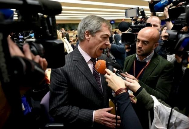 The leader of the Brexit Party, the Briton Nigel Farage, speaks to the press at the European Parliament in Brussels, January 29, 2020