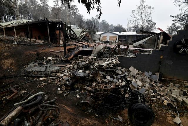 Houses destroyed by fire, in the village of Mogo (southern Australia), January 6, 2020. 