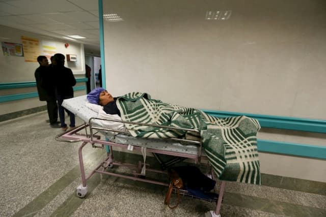 An Iranian woman injured after a stampede at the funeral in Kerman, southeast Iran, January 7, 2020. 