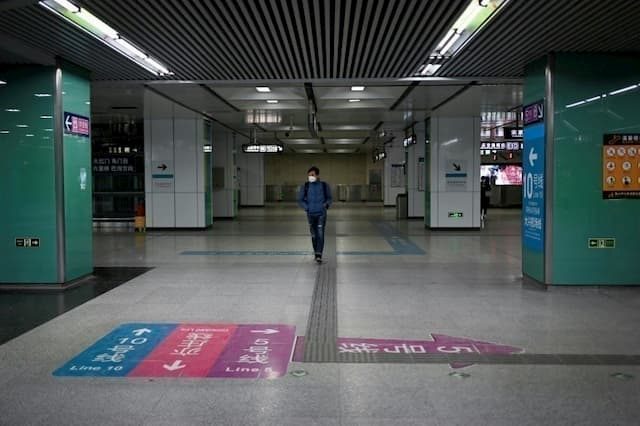 A man in a Beijing metro station on February 10, 2020. 