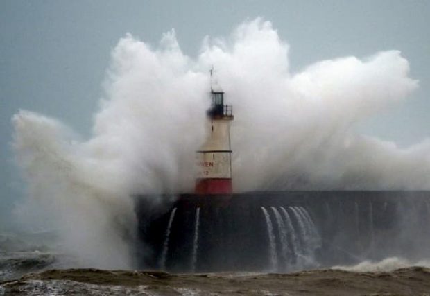 Breaking on Newhaven lighthouse on February 9, 2020, on the south coast of England, crossed by storm Ciara.