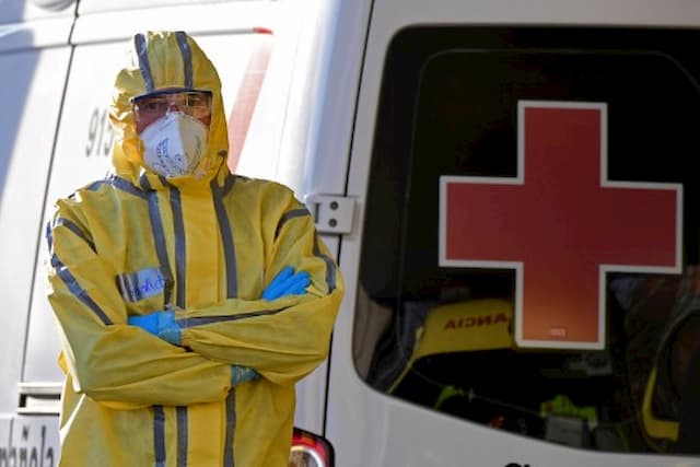 A civil defence worker in Spain helping with the coronavirus epidemic