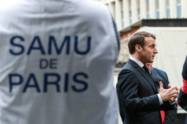 President Emmanuel Macron at the Necker Hospital Emergency Call Centre