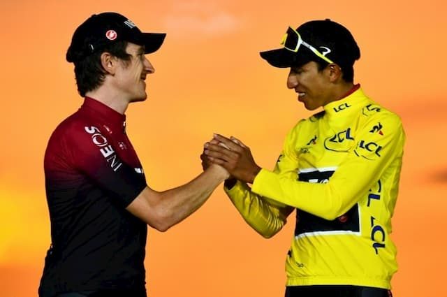 Welsh cyclist Geraint Thomas and Colombian Egan Bernal on the podium of the Tour de France in Paris on July 28, 2019.