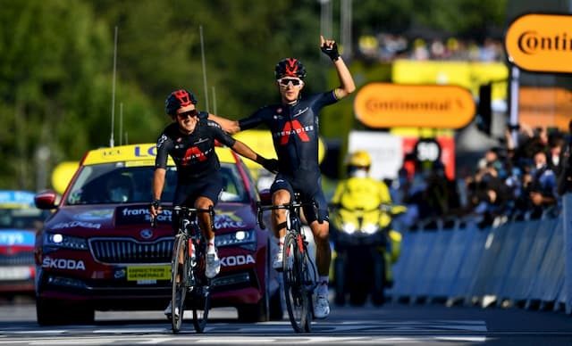 The rider of Ineos Michal Kwiatkowski takes the 18th stage of the Tour de France in front of his teammate Richard Carapaz, on September 17, 2020 in La Roche-sur-Foron.