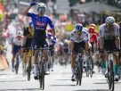 Jasper Philipsen raises his arms after winning the 3rd stage of the Tour de France, in Bayonne, July 3, 2023.