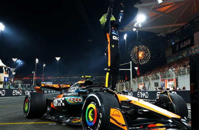 Lando Norris Crowned F1 Champion — Love, Triumph, and a Kiss That Melted the Paddock