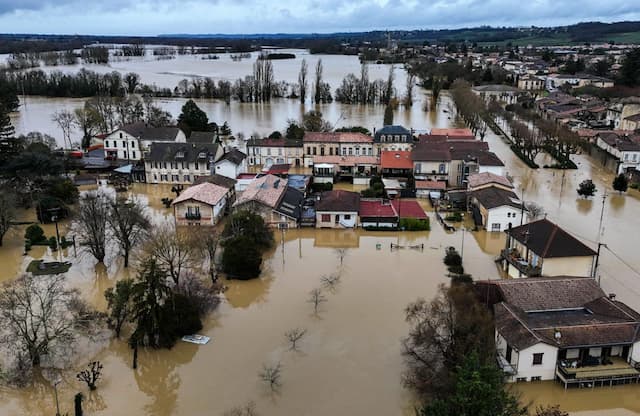 Western France underwater: stunning yet heartbreaking scenes of communities battling the worst floods in decades