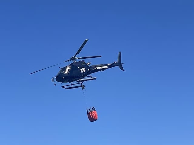 The Morane bomber helicopter made three drops at Primelin on Saturday August 1.